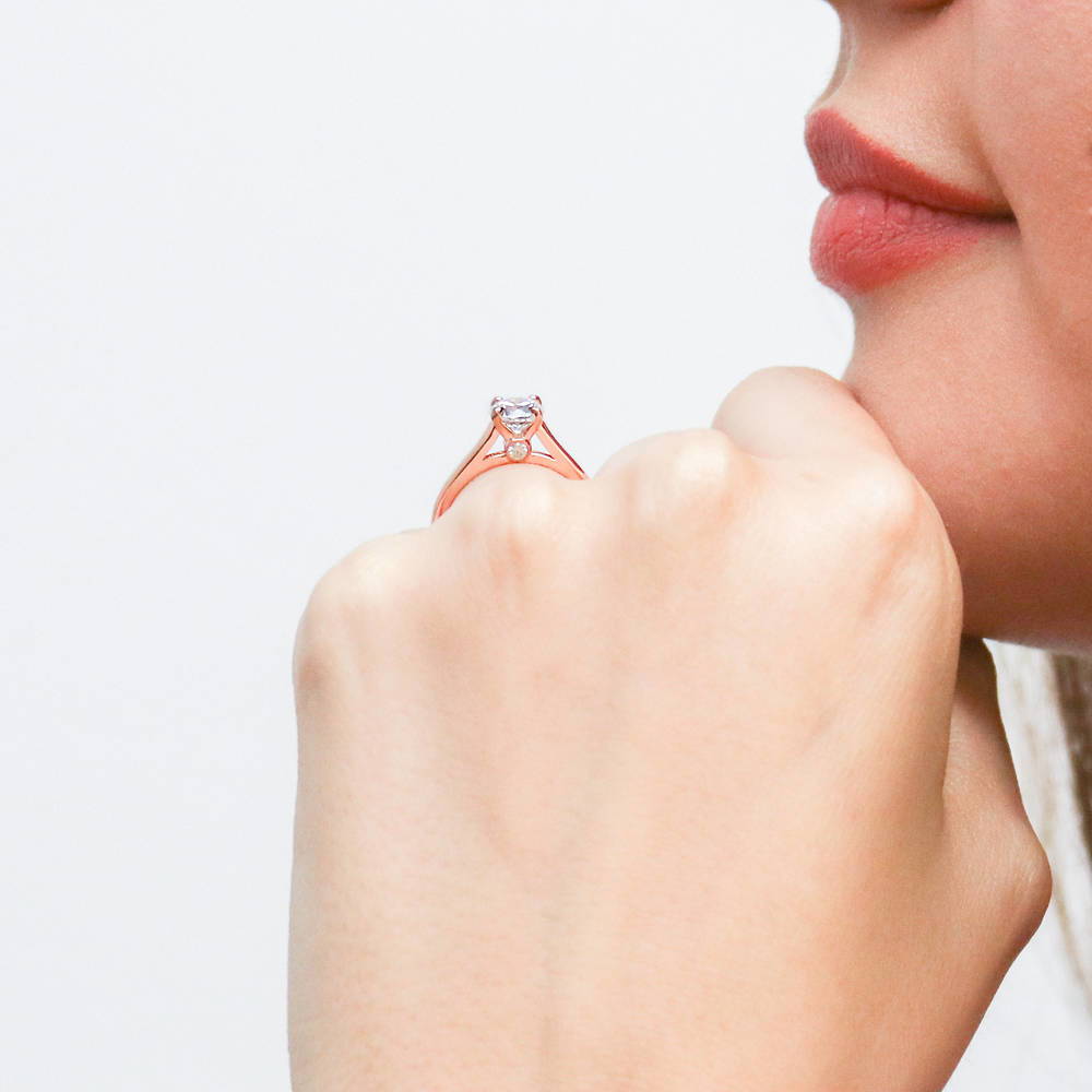 Model wearing Solitaire 0.8ct CZ Ring in Rose Gold Plated Sterling Silver, 2 of 7