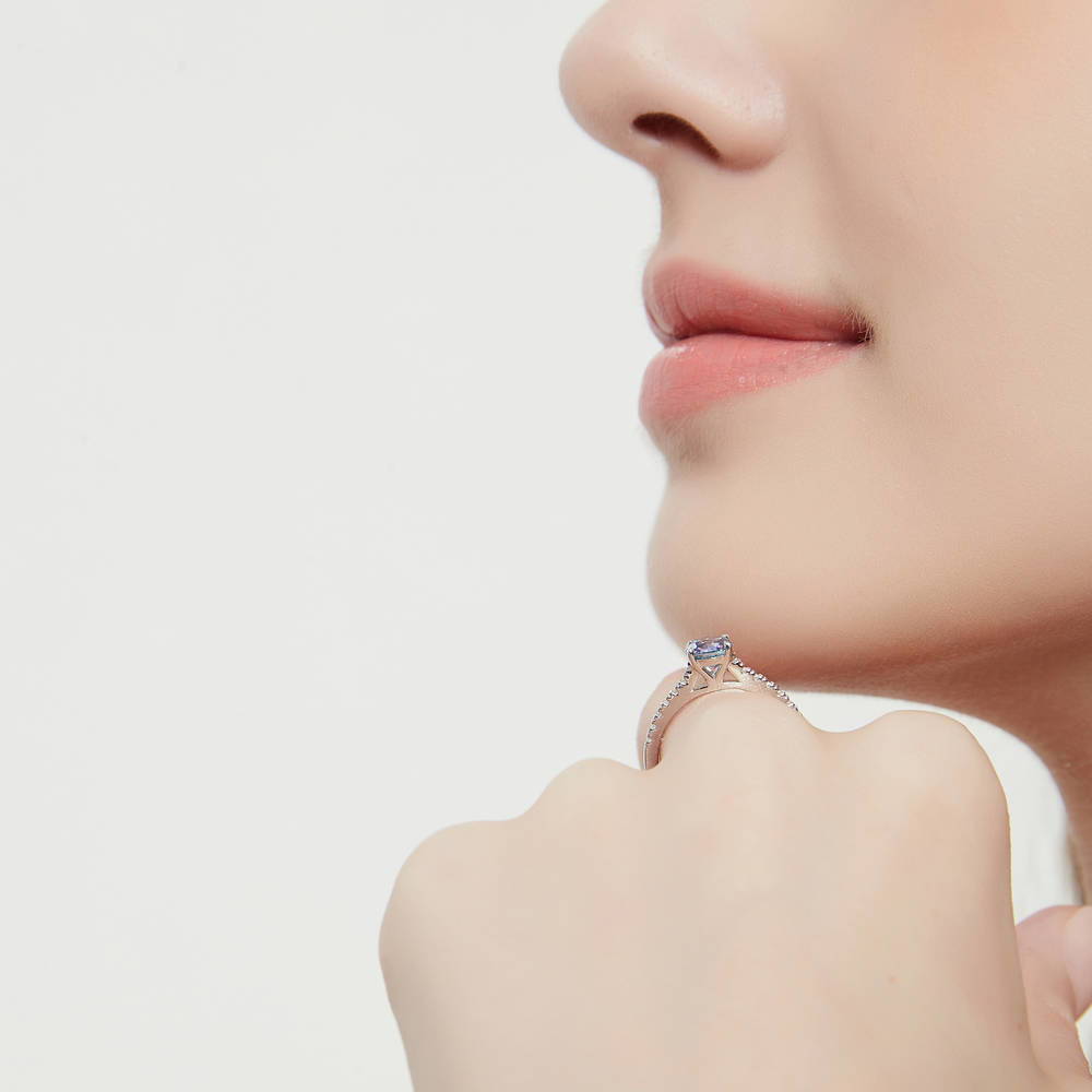 Model wearing Solitaire Kaleidoscope Purple Aqua CZ Ring in Sterling Silver, 3 of 7