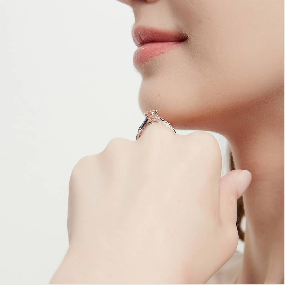 Model wearing Solitaire Kaleidoscope Red Orange CZ Ring in Sterling Silver, 3 of 7