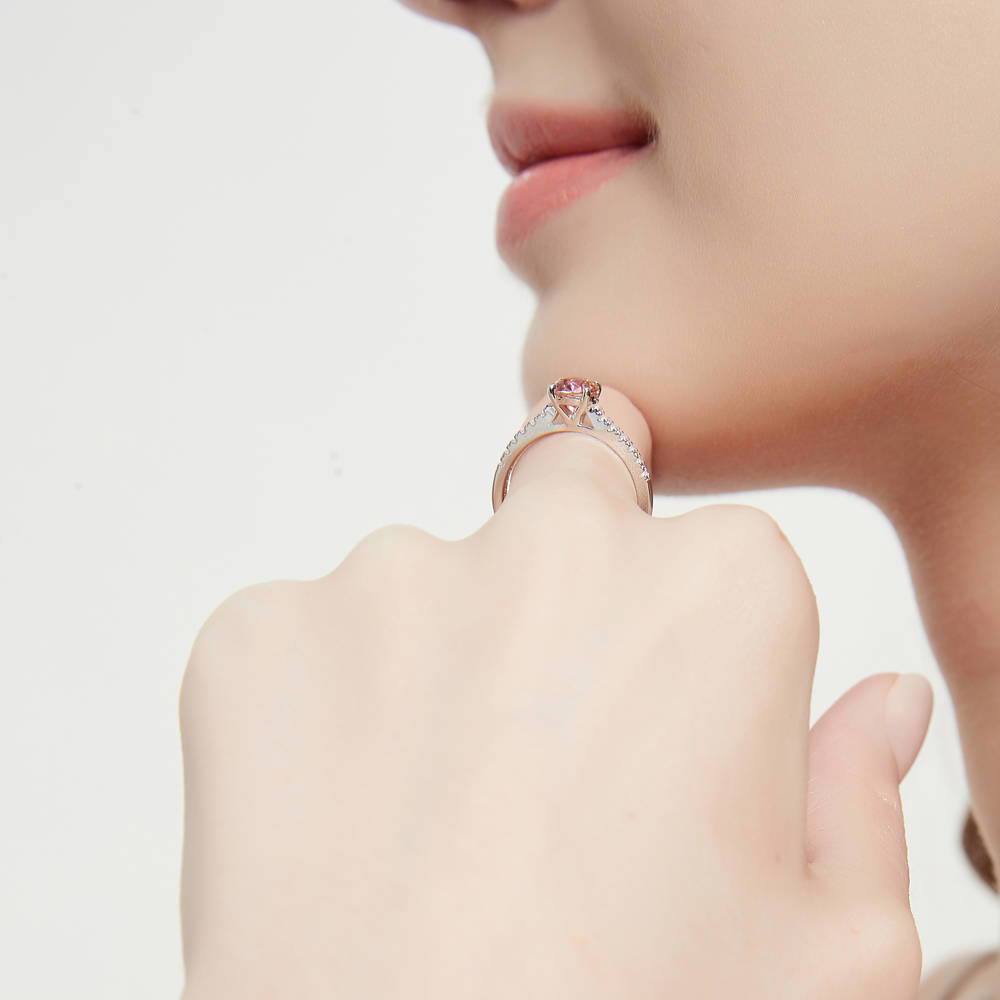 Model wearing Solitaire Kaleidoscope Red Orange CZ Ring in Sterling Silver, 3 of 7