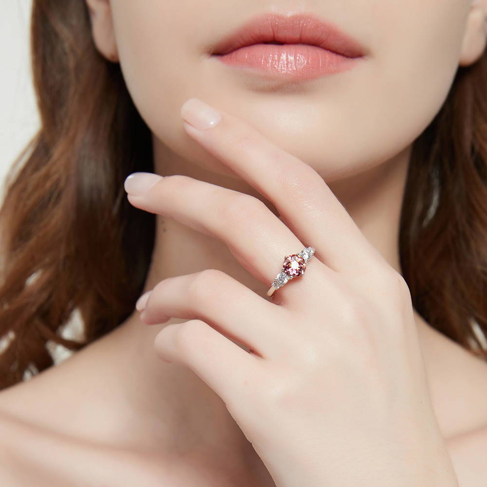 Model wearing Solitaire Kaleidoscope Red Orange CZ Ring in Sterling Silver, 2 of 7