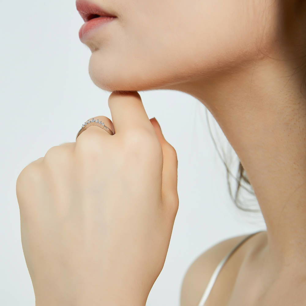 Model wearing 3-Stone Wishbone 7-Stone Cushion CZ Ring Set in Sterling Silver, 18 of 19