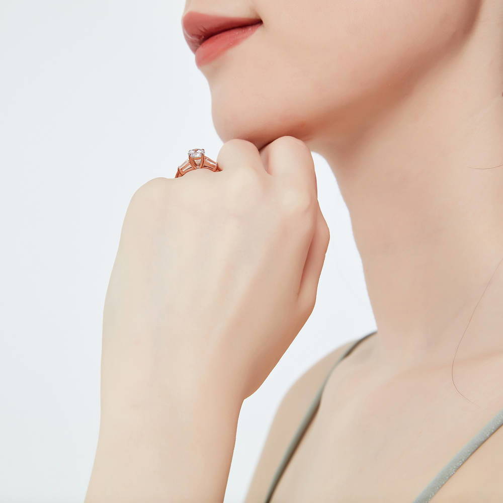Model wearing Solitaire 1ct CZ Ring in Rose Gold Plated Sterling Silver, 3 of 7