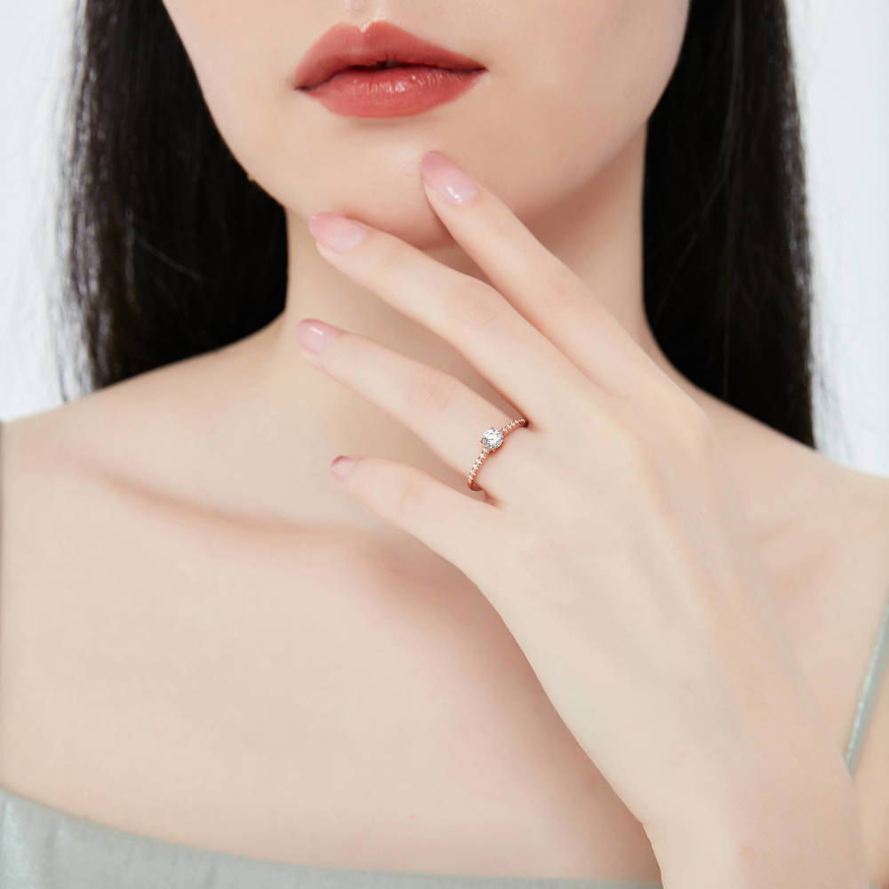 Model wearing Solitaire 0.35ct CZ Ring in Rose Gold Plated Sterling Silver, 2 of 7