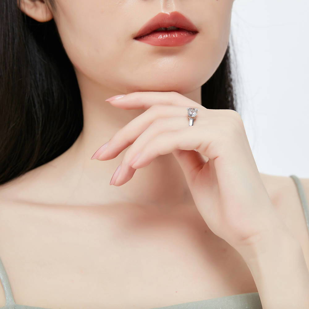 Model wearing 3-Stone Infinity Criss Cross 2ct CZ Ring Set in Sterling Silver, 16 of 18