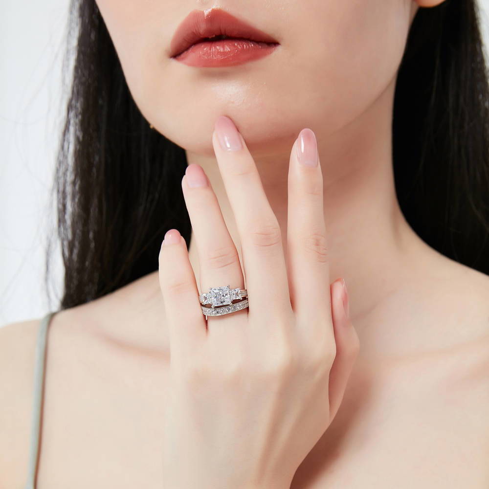 Model wearing 3-Stone 2ct Princess CZ Ring Set in Sterling Silver, 2 of 16