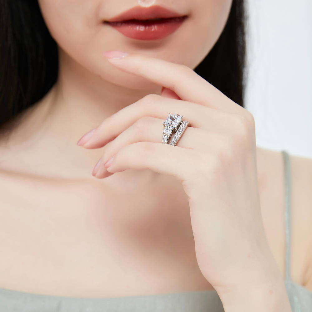 Model wearing 3-Stone 2ct Princess CZ Ring Set in Sterling Silver, 10 of 16