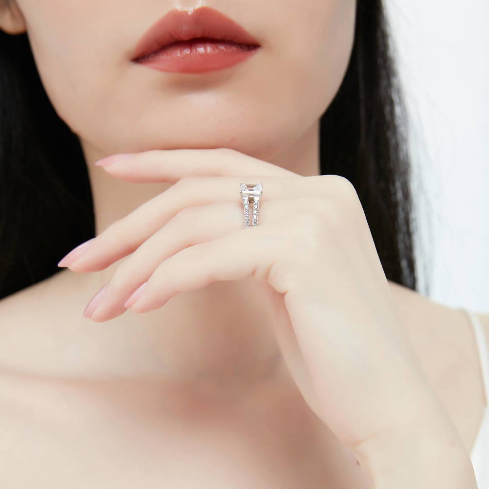 Model wearing Solitaire 2ct Princess CZ Split Shank Ring in Sterling Silver, 7 of 9