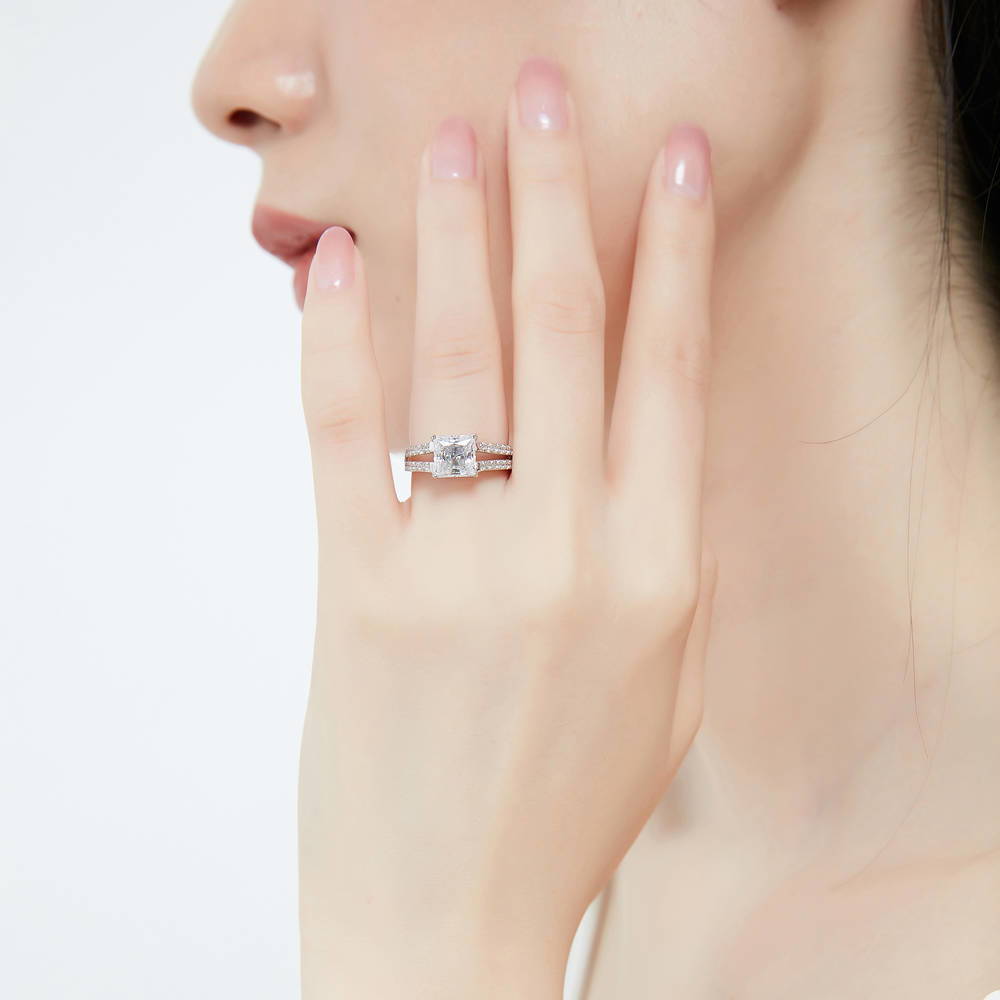 Model wearing Solitaire 2ct Princess CZ Split Shank Ring in Sterling Silver, 2 of 9