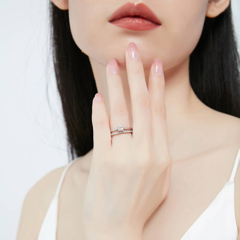 Model wearing Solitaire 0.4ct Princess CZ Ring in Sterling Silver, 8 of 14