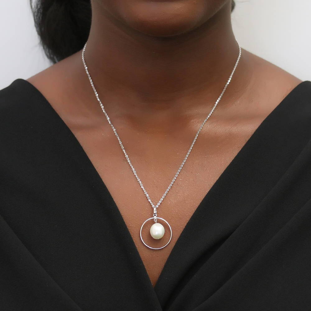 Model wearing Open Circle White Baroque Cultured Pearl Necklace in Sterling Silver, 2 of 5