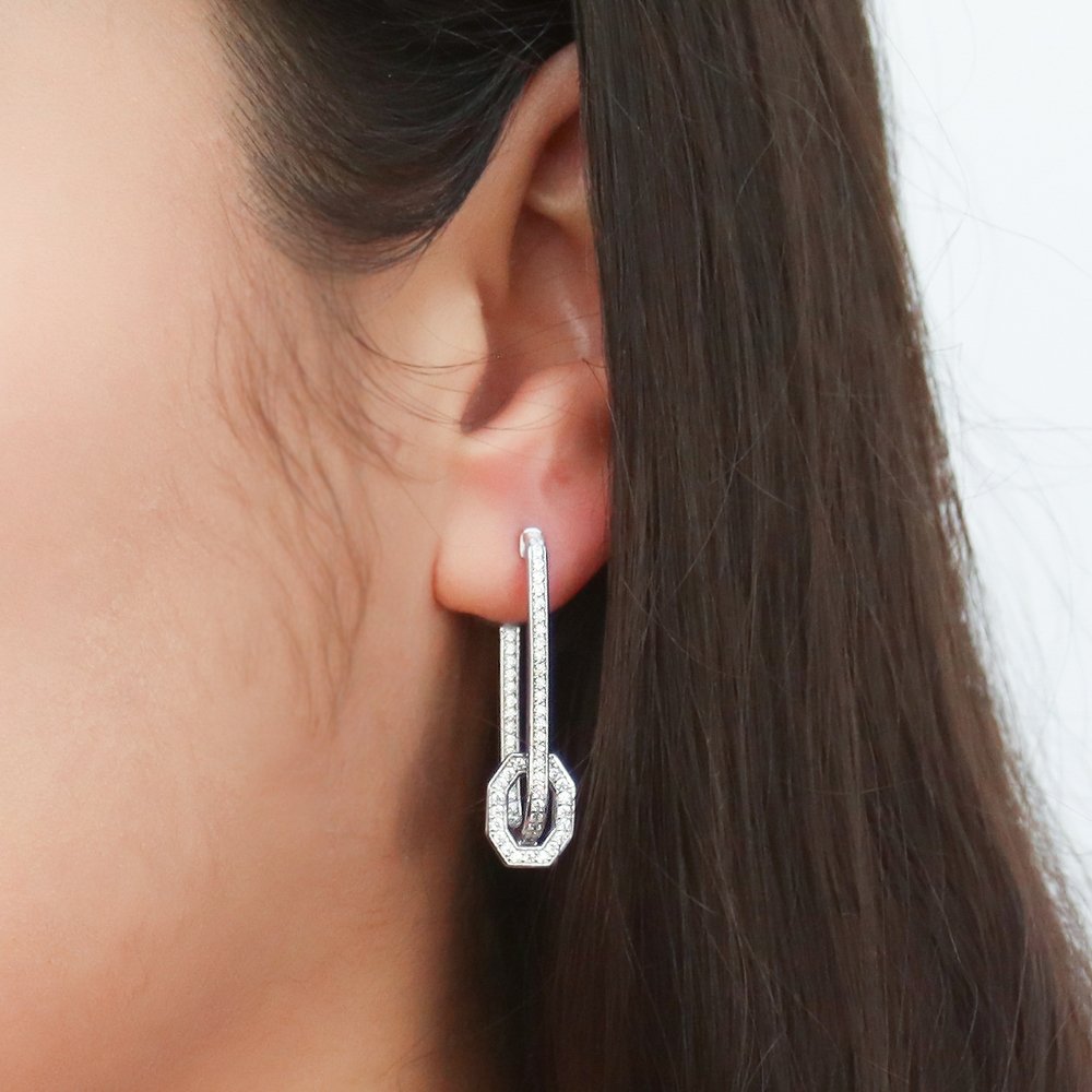 Model wearing Rectangle CZ Inside-Out Hoop Earrings in Sterling Silver 1.3 inch, 2 of 4