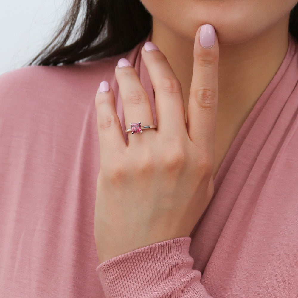 Model wearing Solitaire Wishbone Red Princess CZ Ring Set in Sterling Silver, 6 of 16