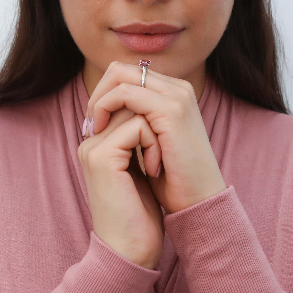 Model wearing Solitaire Wishbone Red Princess CZ Ring Set in Sterling Silver, 13 of 16