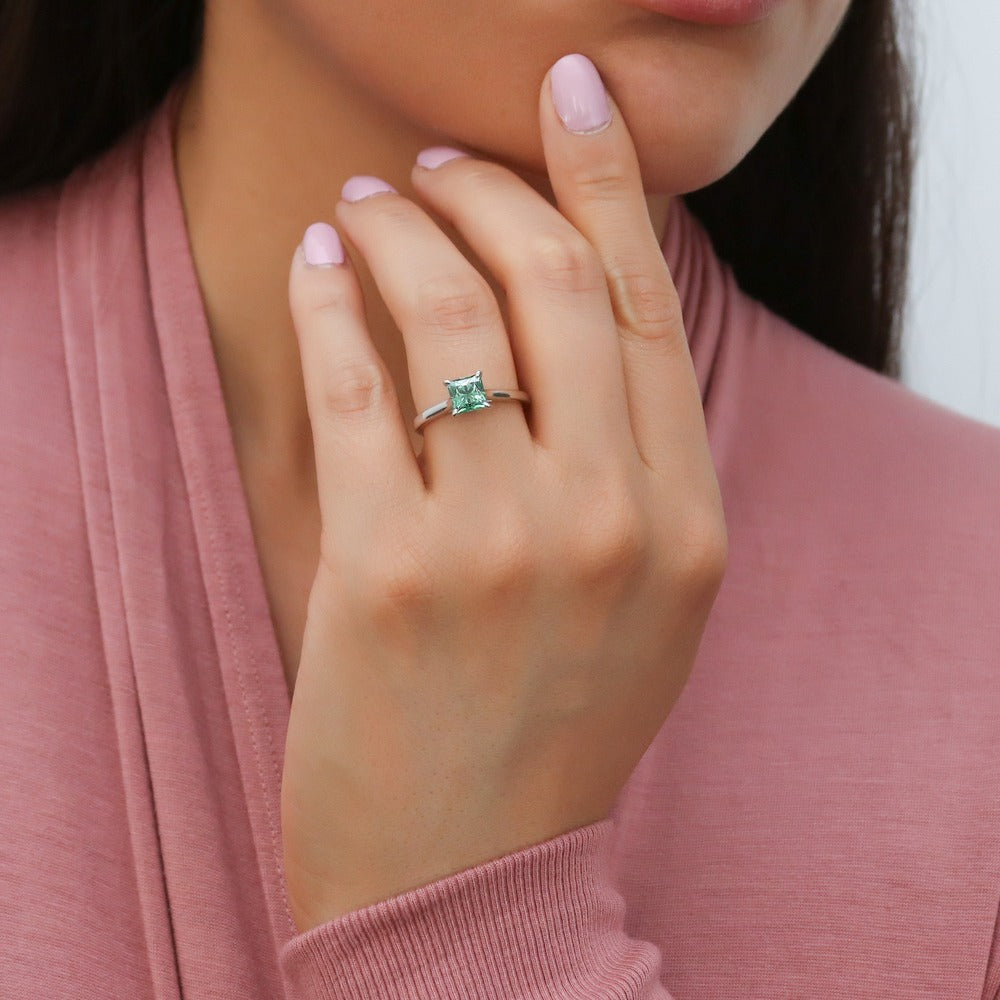 Model wearing Solitaire 1.2ct Green Princess CZ Ring in Sterling Silver, 2 of 8
