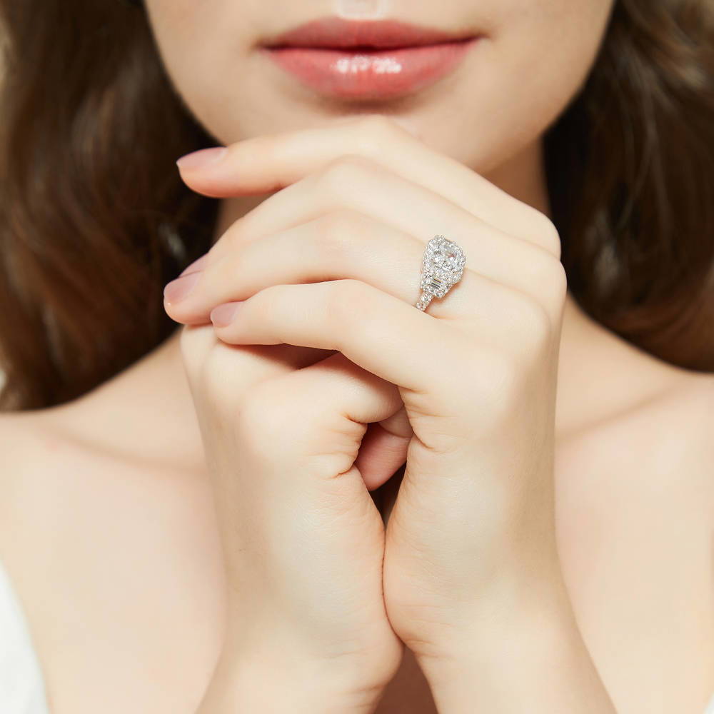Model wearing Halo 3-Stone Art Deco 1.6ct Asscher CZ Ring in Sterling Silver, 9 of 11