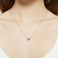 Model wearing Solitaire Kaleidoscope Bezel CZ Necklace in Sterling Silver 0.8ct, Red Orange Color