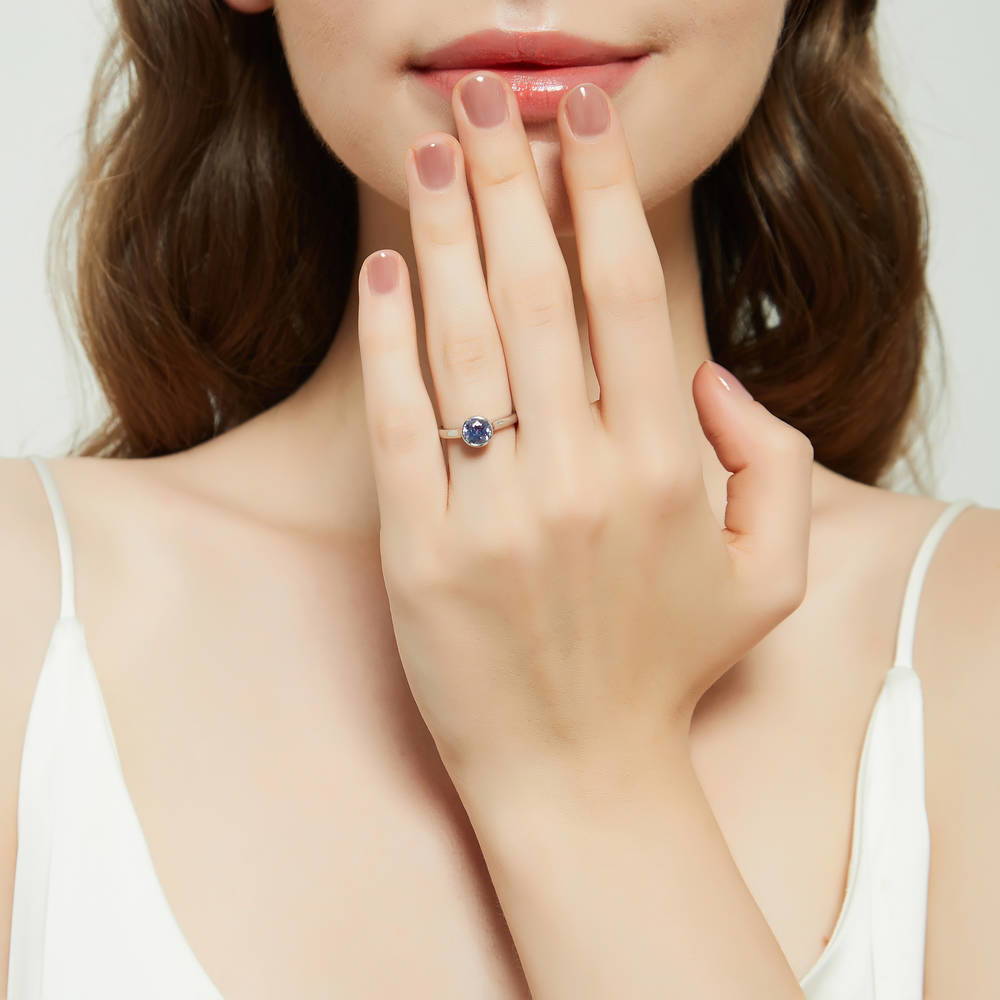 Model wearing Solitaire Kaleidoscope Purple Aqua CZ Ring in Sterling Silver, 2 of 8