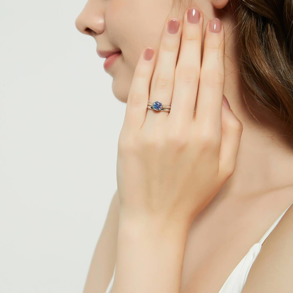 Model wearing Solitaire Kaleidoscope Purple Aqua CZ Ring Set in Sterling Silver, 5 of 13