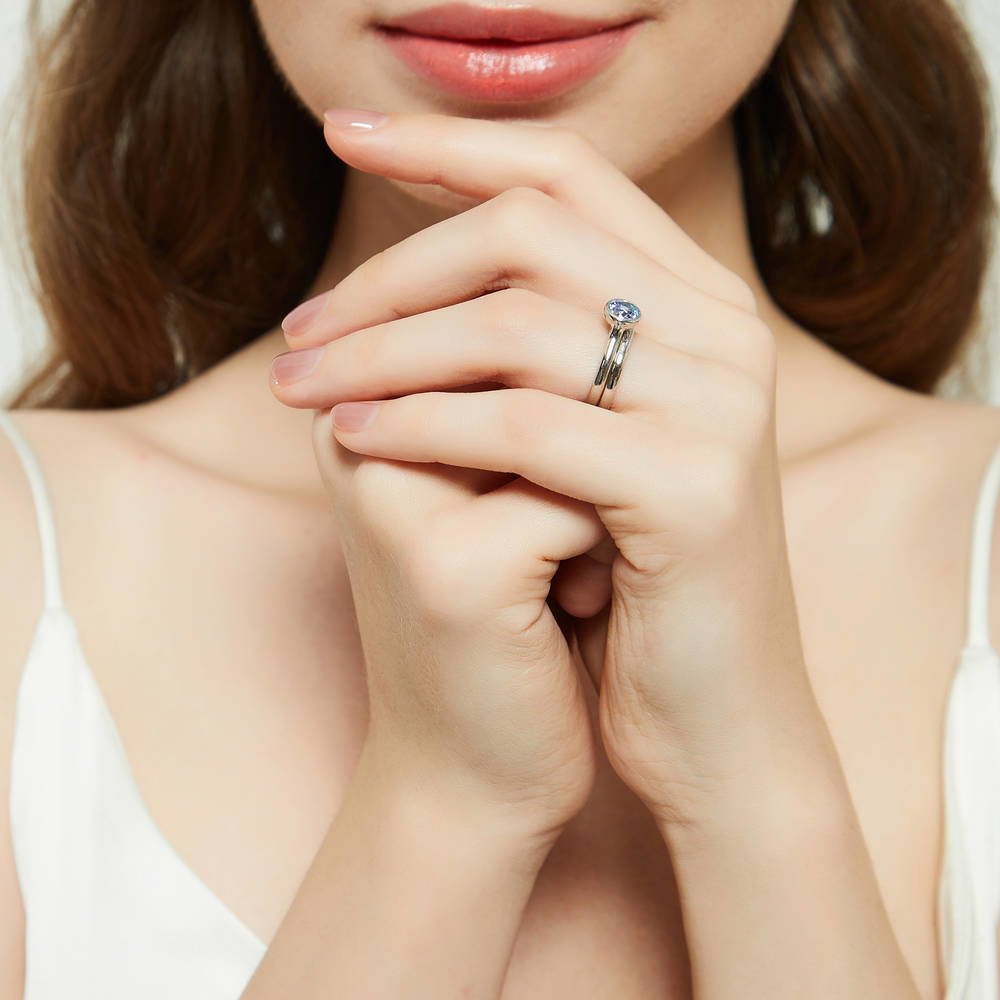 Model wearing Solitaire Kaleidoscope Purple Aqua CZ Ring Set in Sterling Silver, 6 of 13