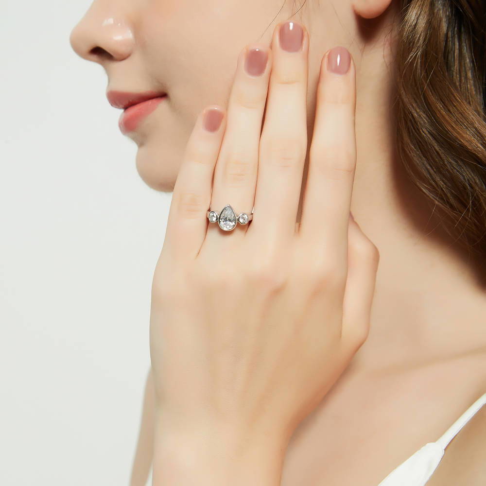Model wearing 3-Stone 1.3ct Pear CZ Ring in Sterling Silver, 6 of 9