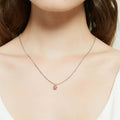 Model wearing Kaleidoscope Solitaire CZ Necklace in Sterling Silver 0.8ct, Red Orange Color