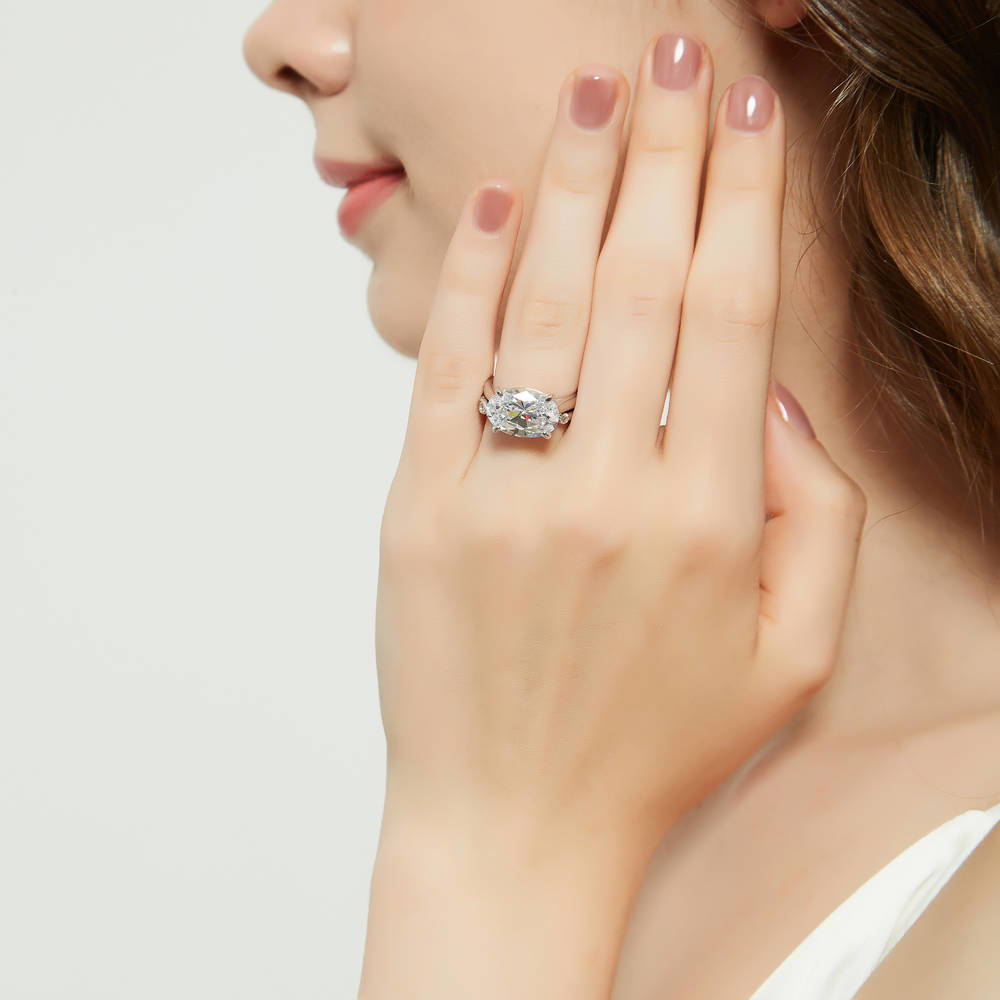 Model wearing Solitaire Art Deco East-West Oval CZ Ring Set in Sterling Silver, 6 of 18