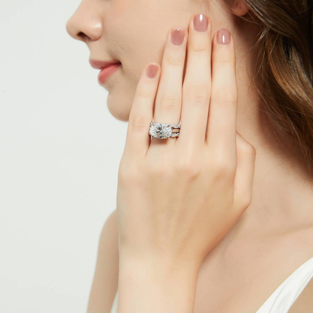 Model wearing Solitaire Art Deco East-West Oval CZ Ring Set in Sterling Silver, 6 of 19