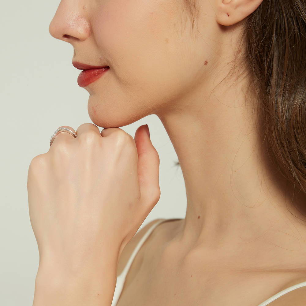 Model wearing Wishbone CZ Curved Half Eternity Ring in Sterling Silver, 8 of 8