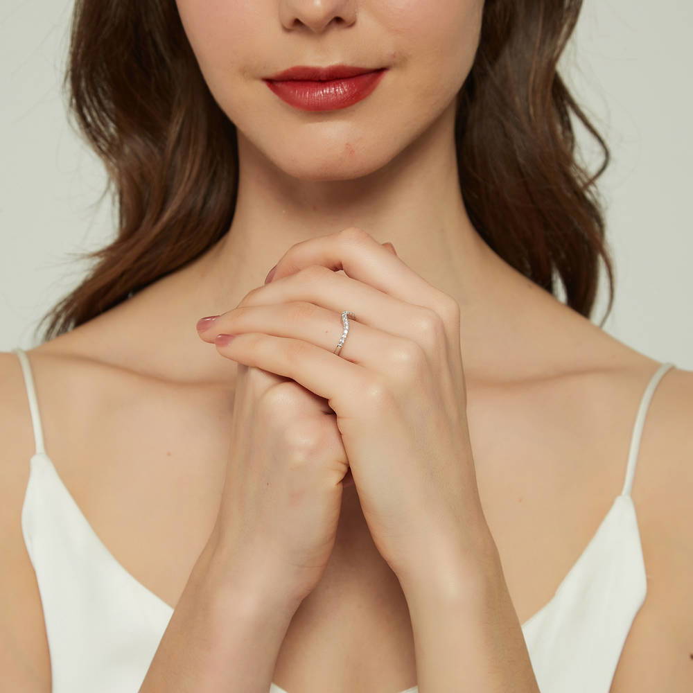Model wearing Wishbone CZ Curved Half Eternity Ring in Sterling Silver, 6 of 8
