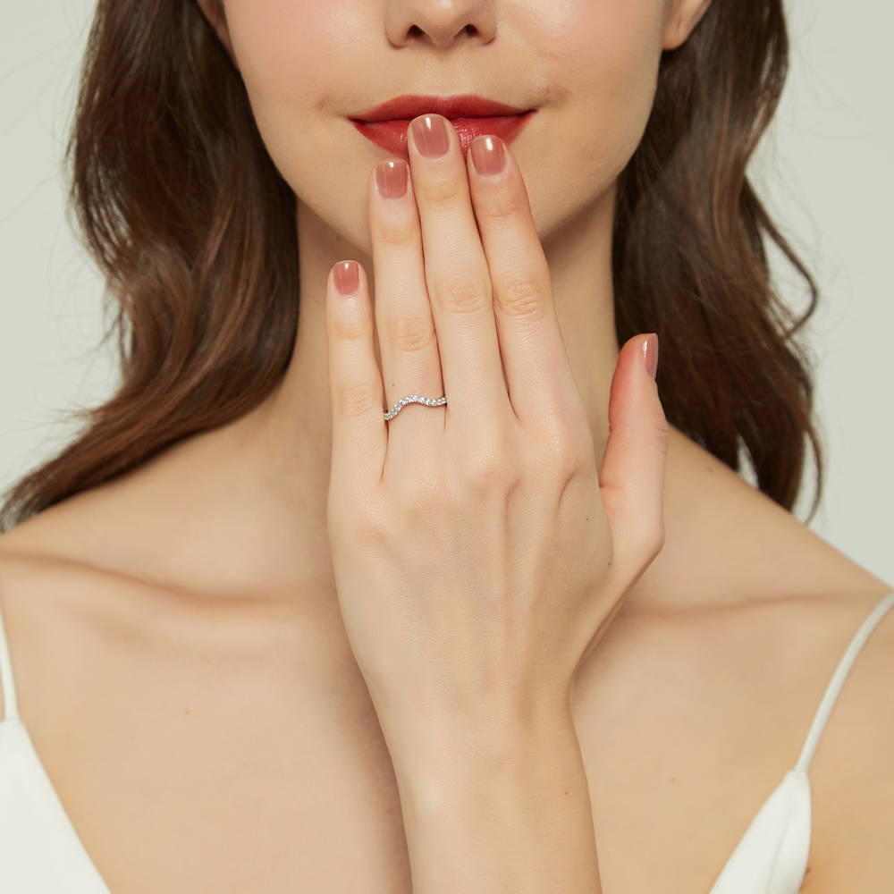 Model wearing Wishbone CZ Curved Half Eternity Ring in Sterling Silver, 2 of 8