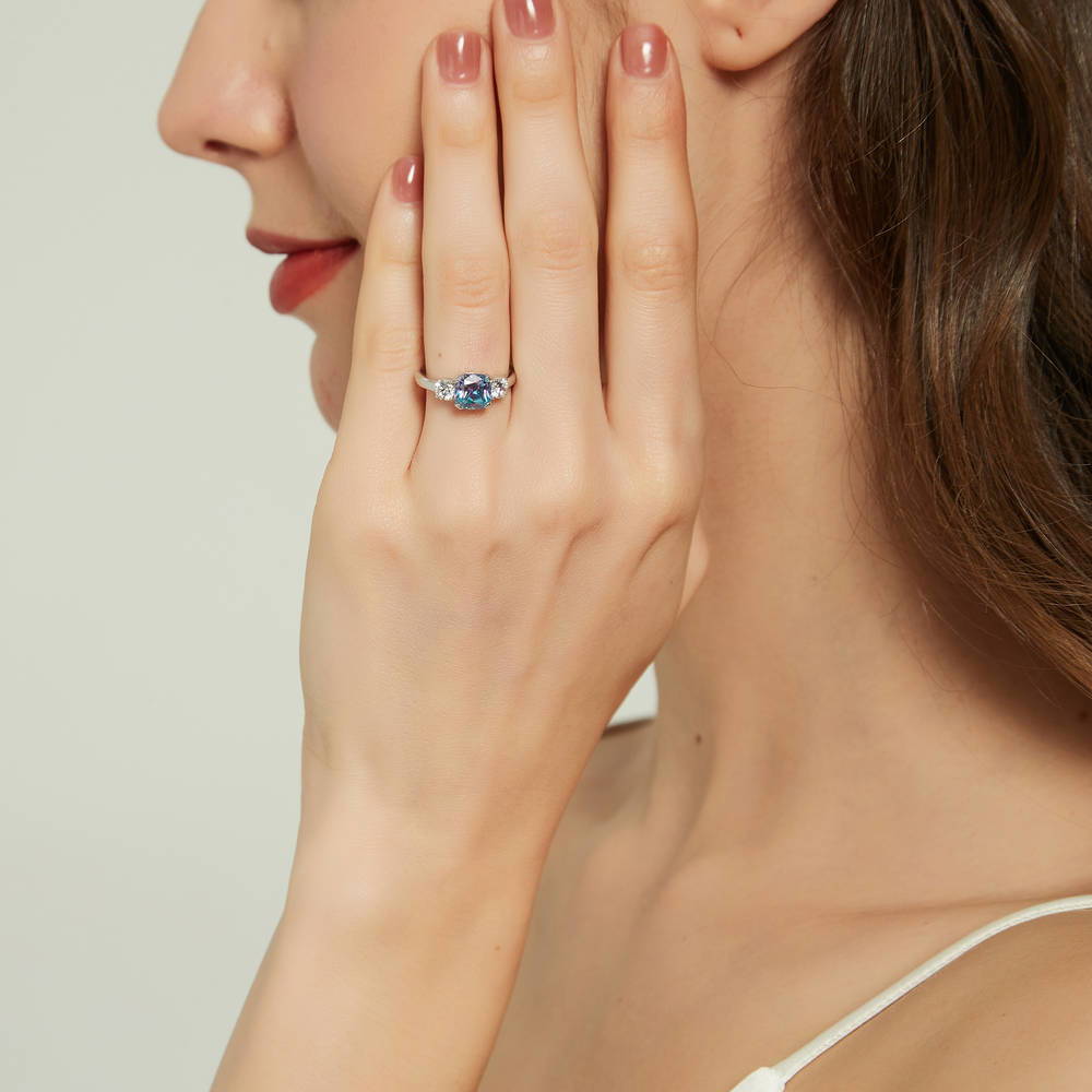 Model wearing 3-Stone Kaleidoscope 2ct Purple Aqua CZ Ring in Sterling Silver, 3 of 8