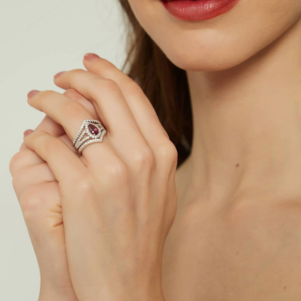Model wearing Halo Wishbone Red Pear CZ Split Shank Ring Set in Sterling Silver, 3 of 15