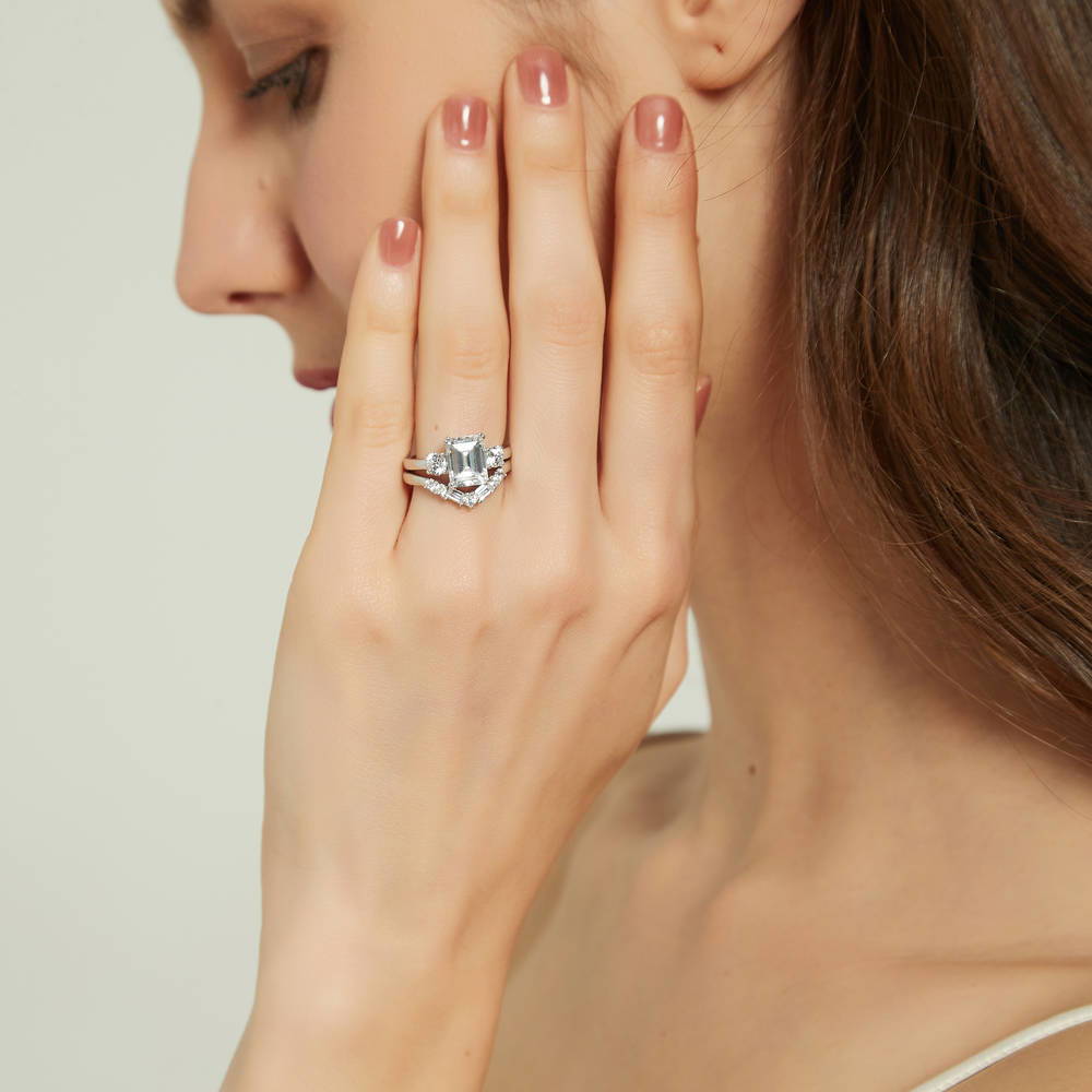 Model wearing 3-Stone 2.6ct Emerald Cut CZ Ring in Sterling Silver, 16 of 19