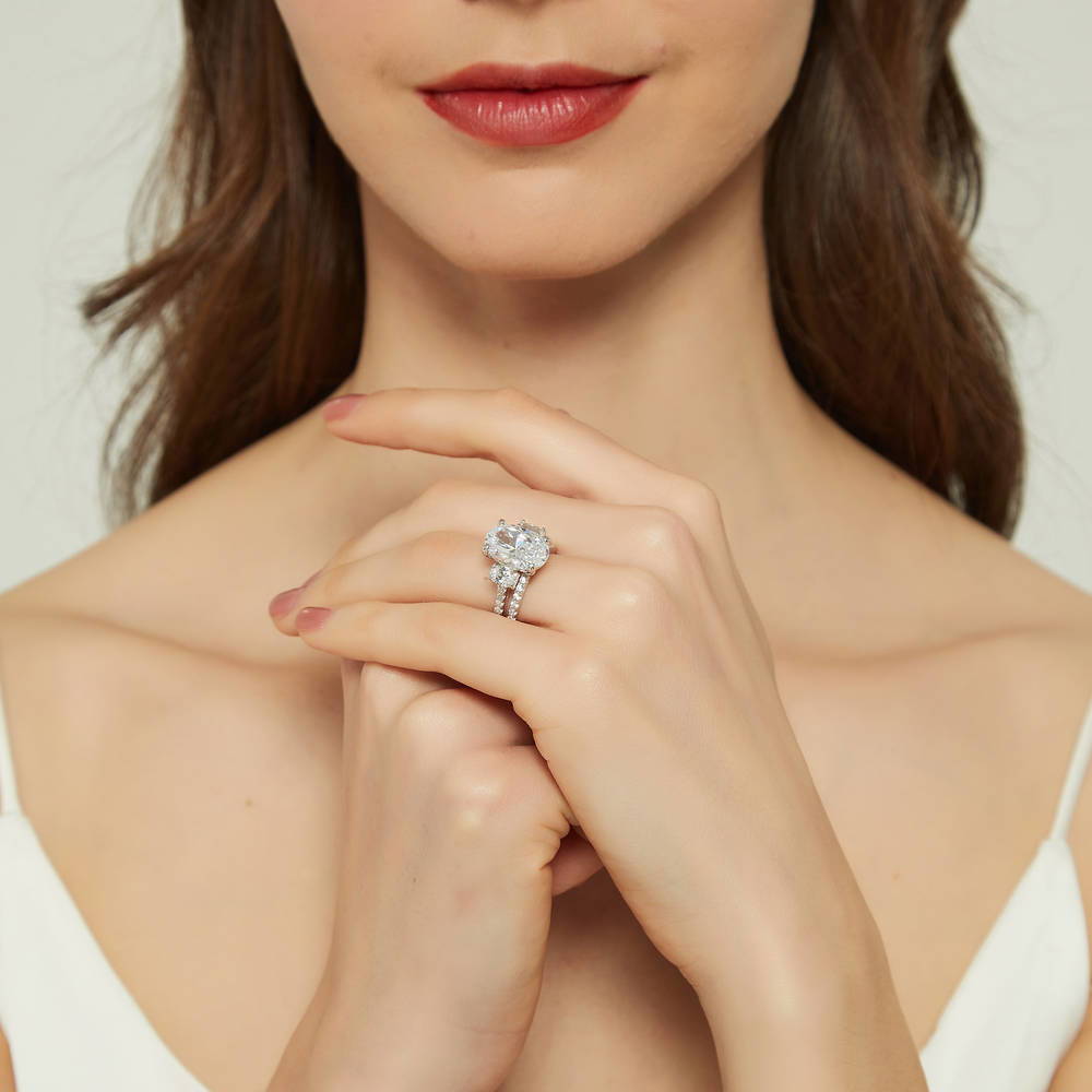 Model wearing 3-Stone 5.5ct Oval CZ Ring Set in Sterling Silver, 7 of 16