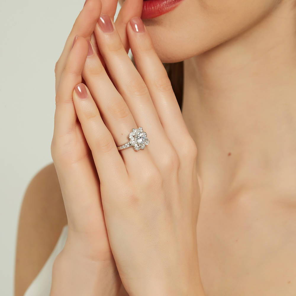 Model wearing Flower Halo CZ Ring in Sterling Silver, 6 of 12