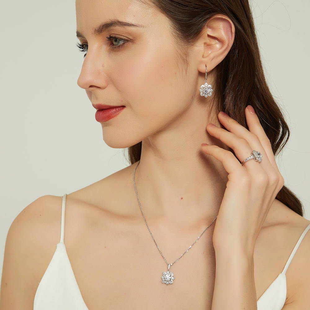 Model wearing Flower Halo CZ Ring in Sterling Silver, 11 of 12