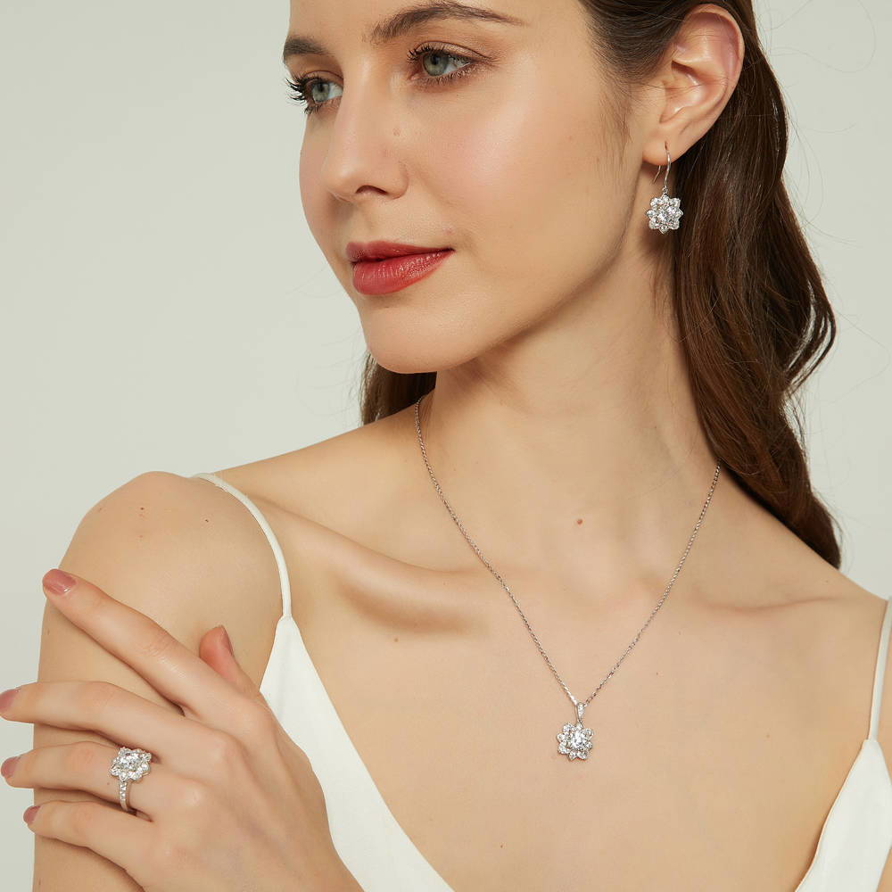 Model wearing Flower Halo CZ Ring in Sterling Silver, 10 of 12