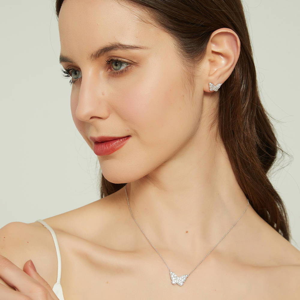 Model wearing Butterfly CZ Necklace in Sterling Silver, 3 of 6