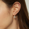 Model wearing CZ Leverback Earrings in Sterling Silver, Yellow Gold Flashed