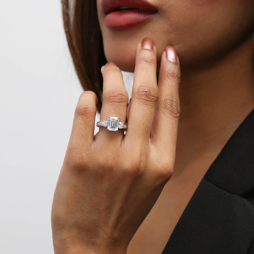 Model wearing 3-Stone 2.1ct Emerald Cut CZ Ring Set in Sterling Silver, 14 of 18