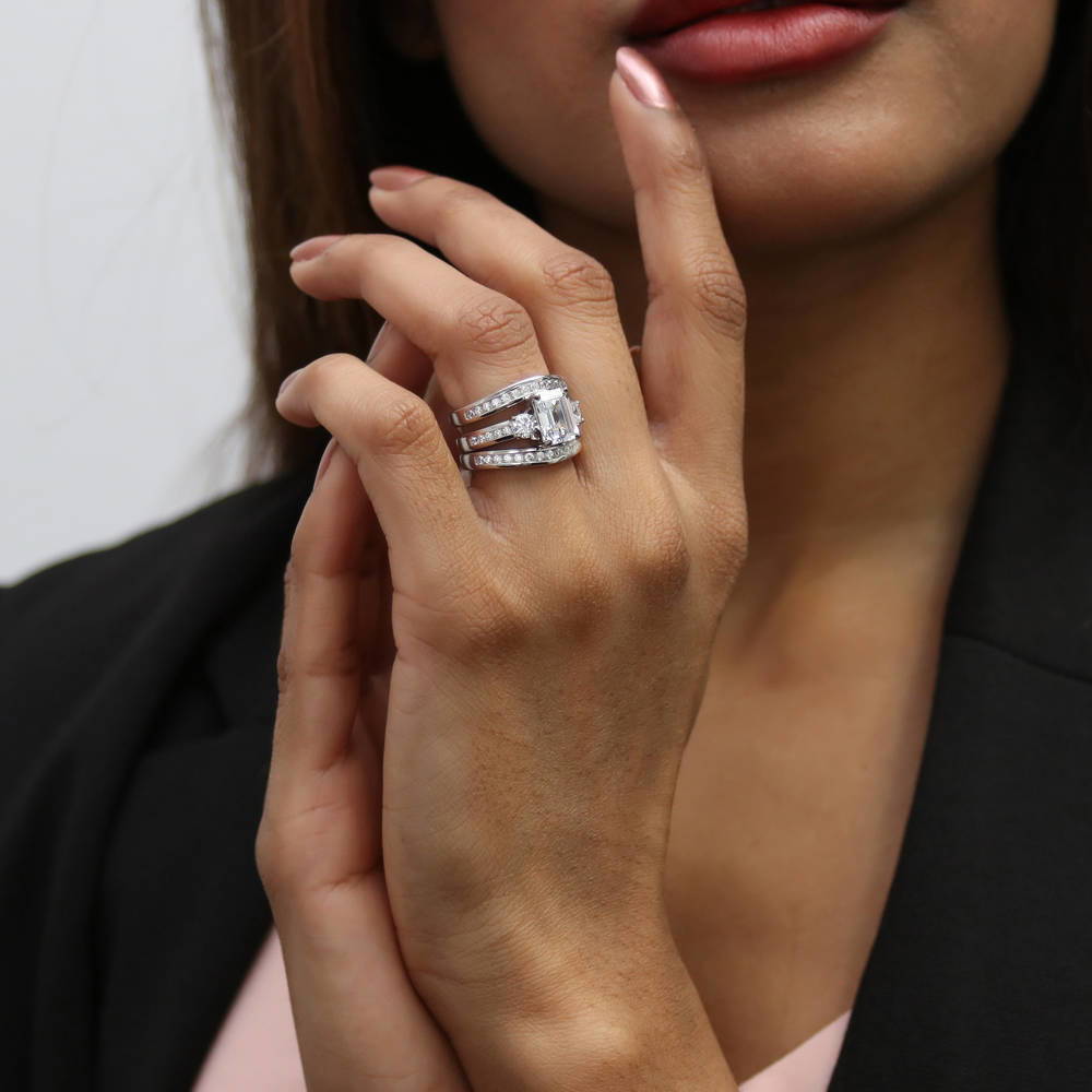 Model wearing 3-Stone 2.1ct Emerald Cut CZ Ring Set in Sterling Silver, 3 of 18