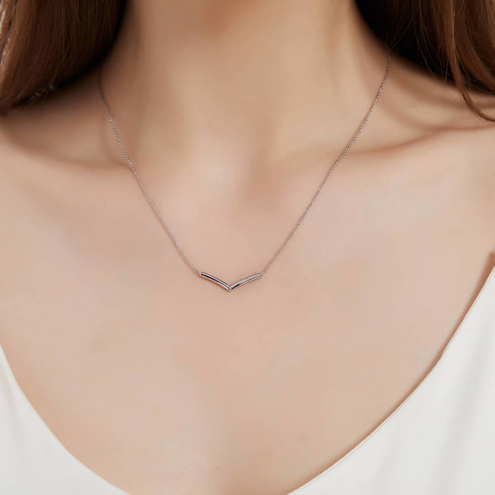 Model wearing Wishbone Chevron V Shaped Necklace in Sterling Silver, 2 of 6