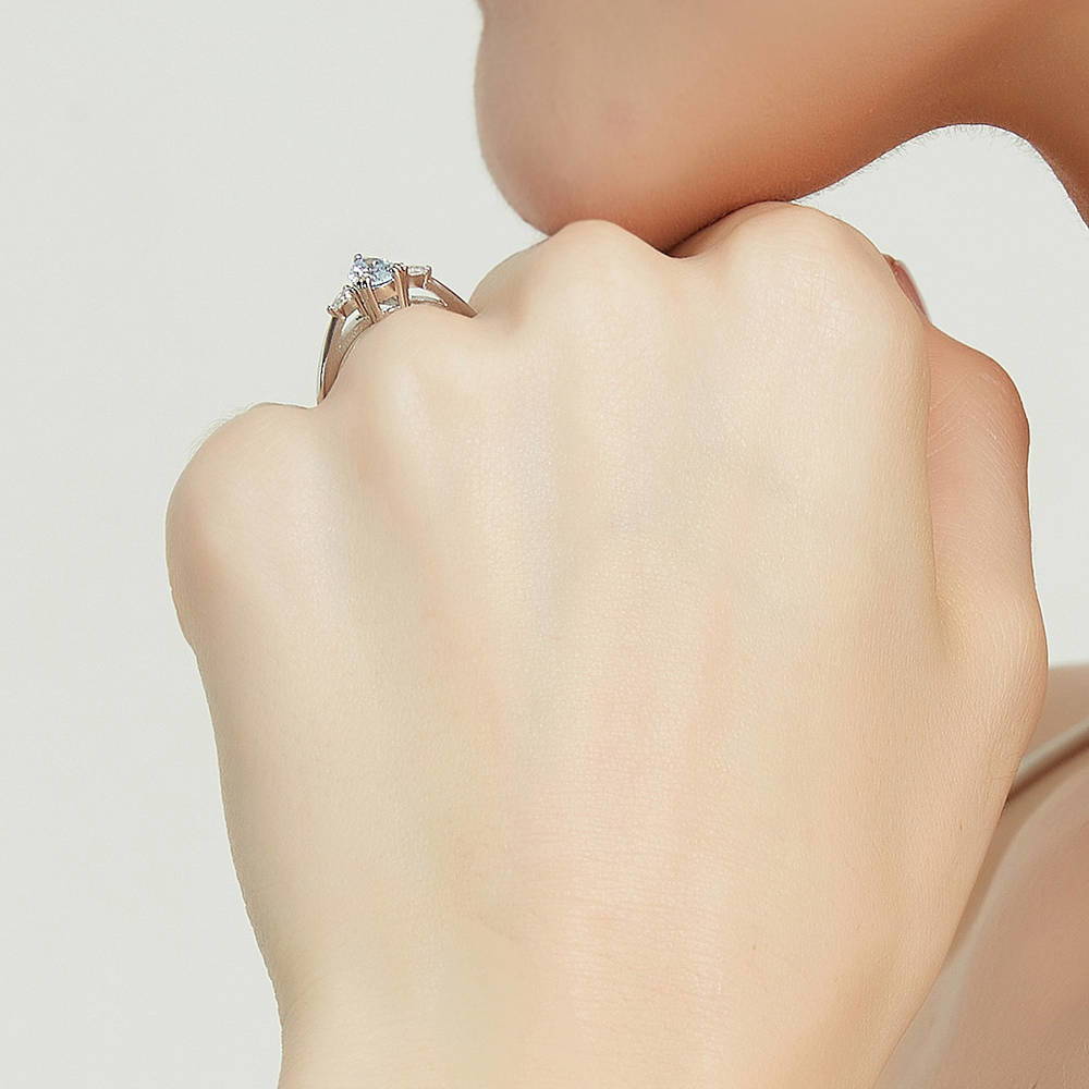 Model wearing 3-Stone 0.8ct Greyish Blue Pear CZ Ring in Sterling Silver, 7 of 8