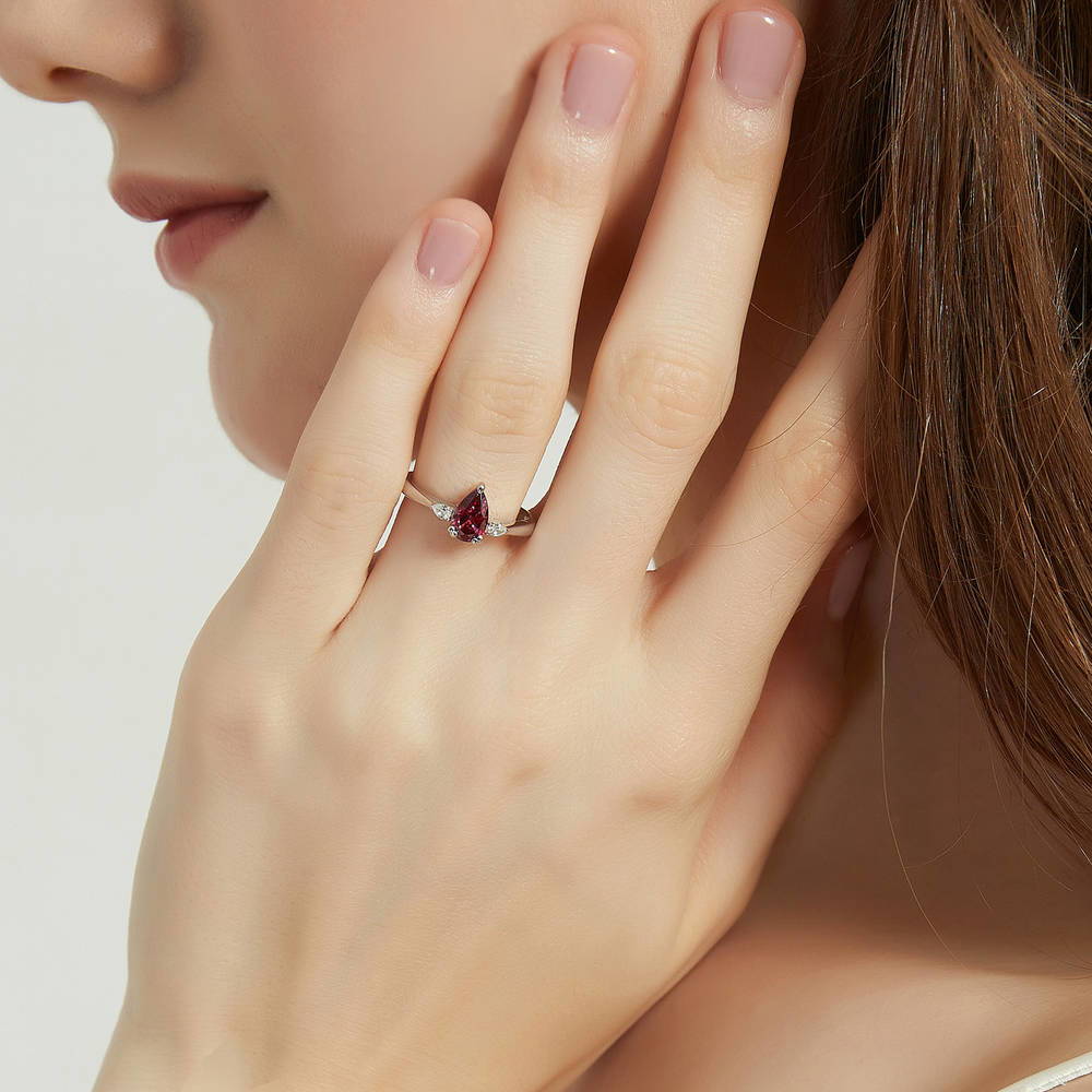 Model wearing 3-Stone 0.8ct Red Pear CZ Ring in Sterling Silver, 2 of 8