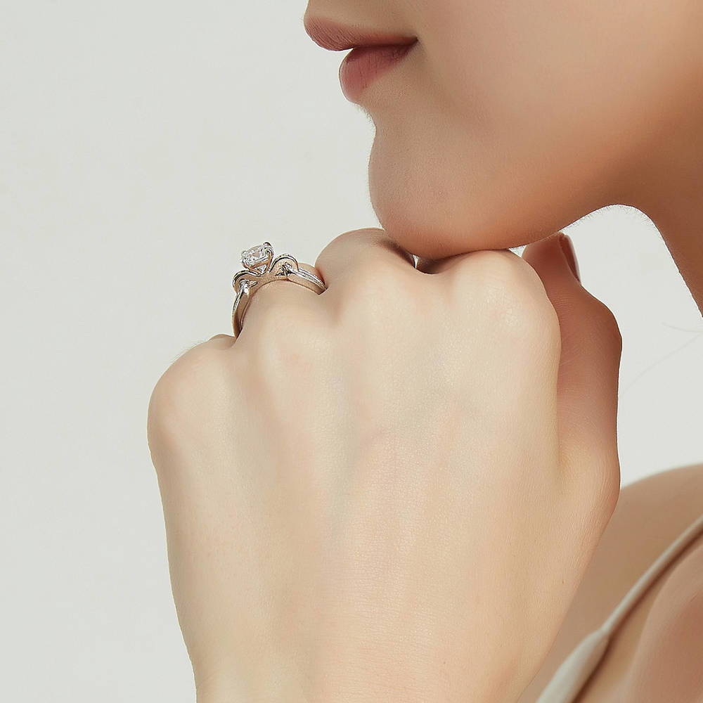 Model wearing Solitaire Interlocking 1.25ct CZ Ring in Sterling Silver, 7 of 8