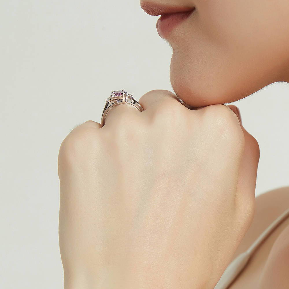 Model wearing 3-Stone 1.2ct Purple Oval CZ Ring in Sterling Silver, 7 of 8