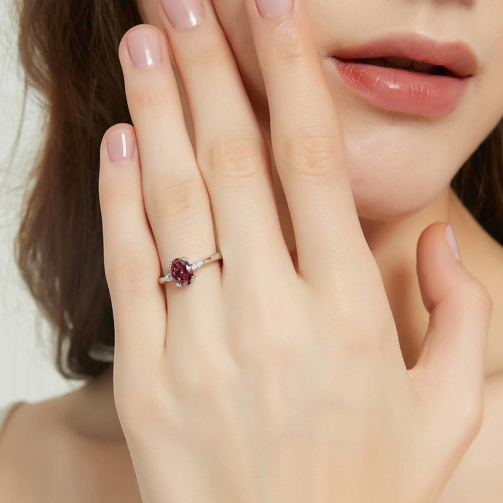 Model wearing 3-Stone 1.2ct Red Oval CZ Ring in Sterling Silver, 2 of 8