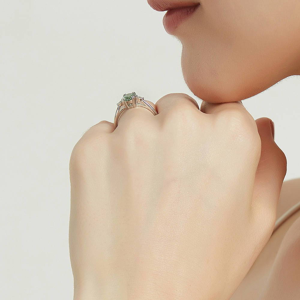 Model wearing 3-Stone 1.2ct Green Oval CZ Ring in Sterling Silver, 7 of 8