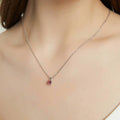 Model wearing Kaleidoscope Solitaire CZ Necklace in Sterling Silver 0.8ct, Red Orange Color